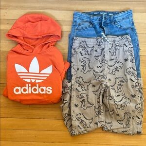 Adidas Orange Hoodie with Dinosaur Print Pants and Blue Jeans